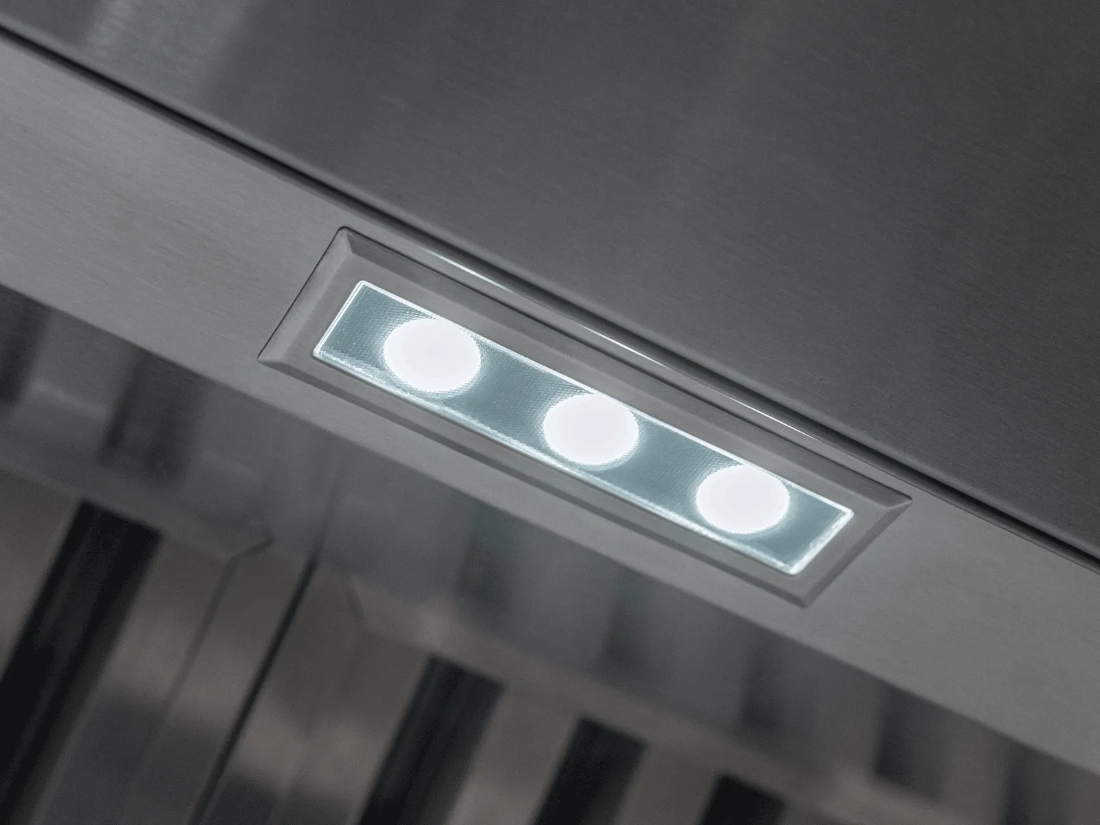 Multi-level LED lights on a Thermador Masterpiece HMCB36WS chimney wall hood.