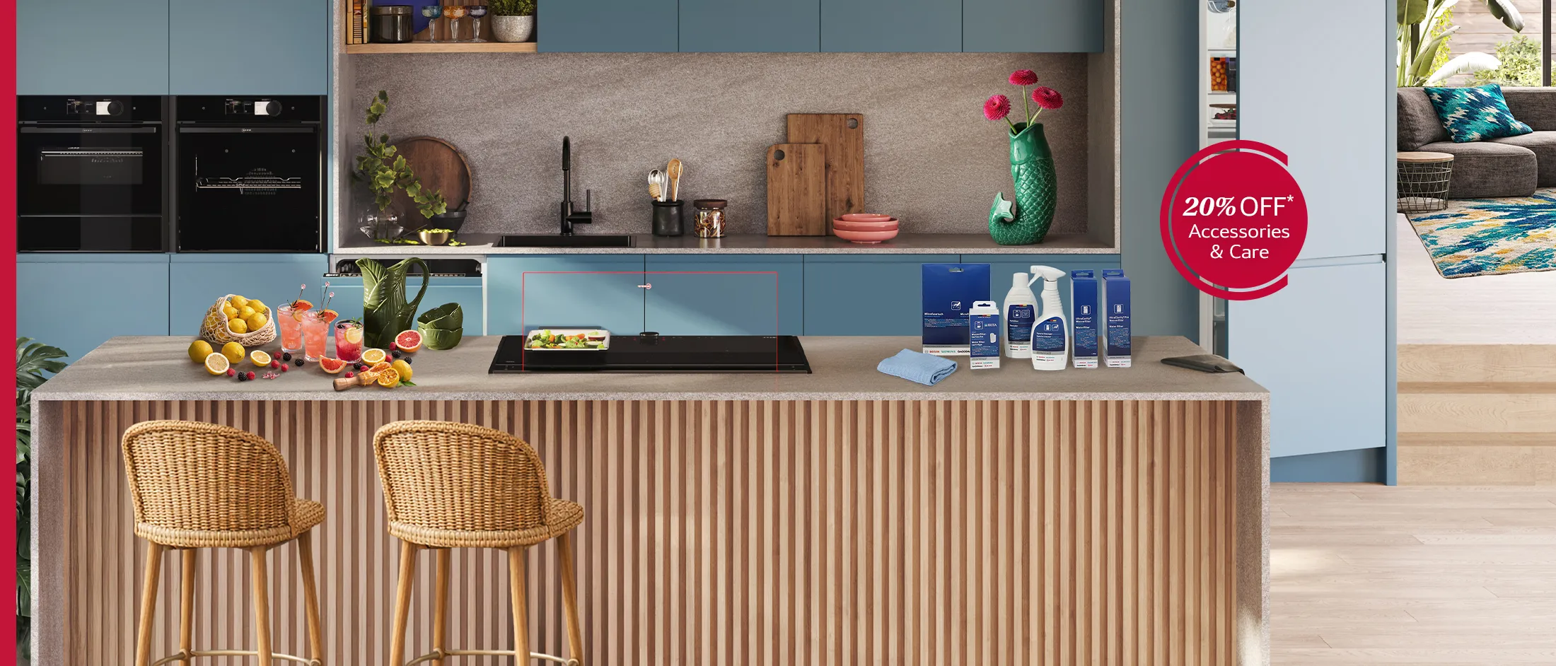 ertical kitchen scene with blue cabinets and a fluted wooden island; blue-packaged appliance accessories and cleaning bottles sit on the countertop, a green vase with pink flowers and cutting boards are at left, an open fridge is visible at right, and a red circular badge upper-left reads 20% OFF Accessories & Care.