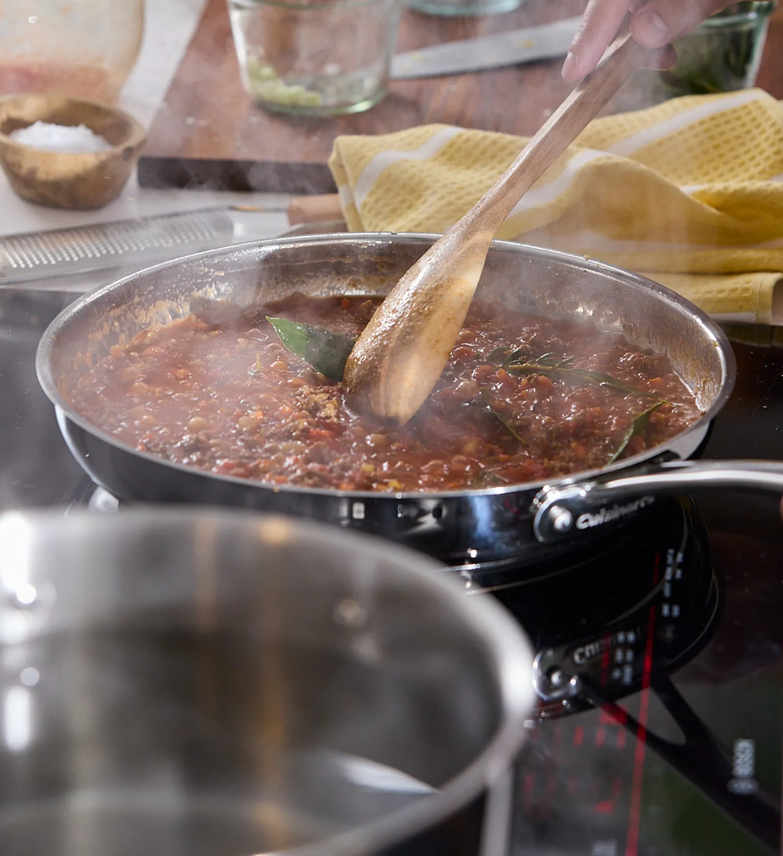 Chef making Bolognese sauce