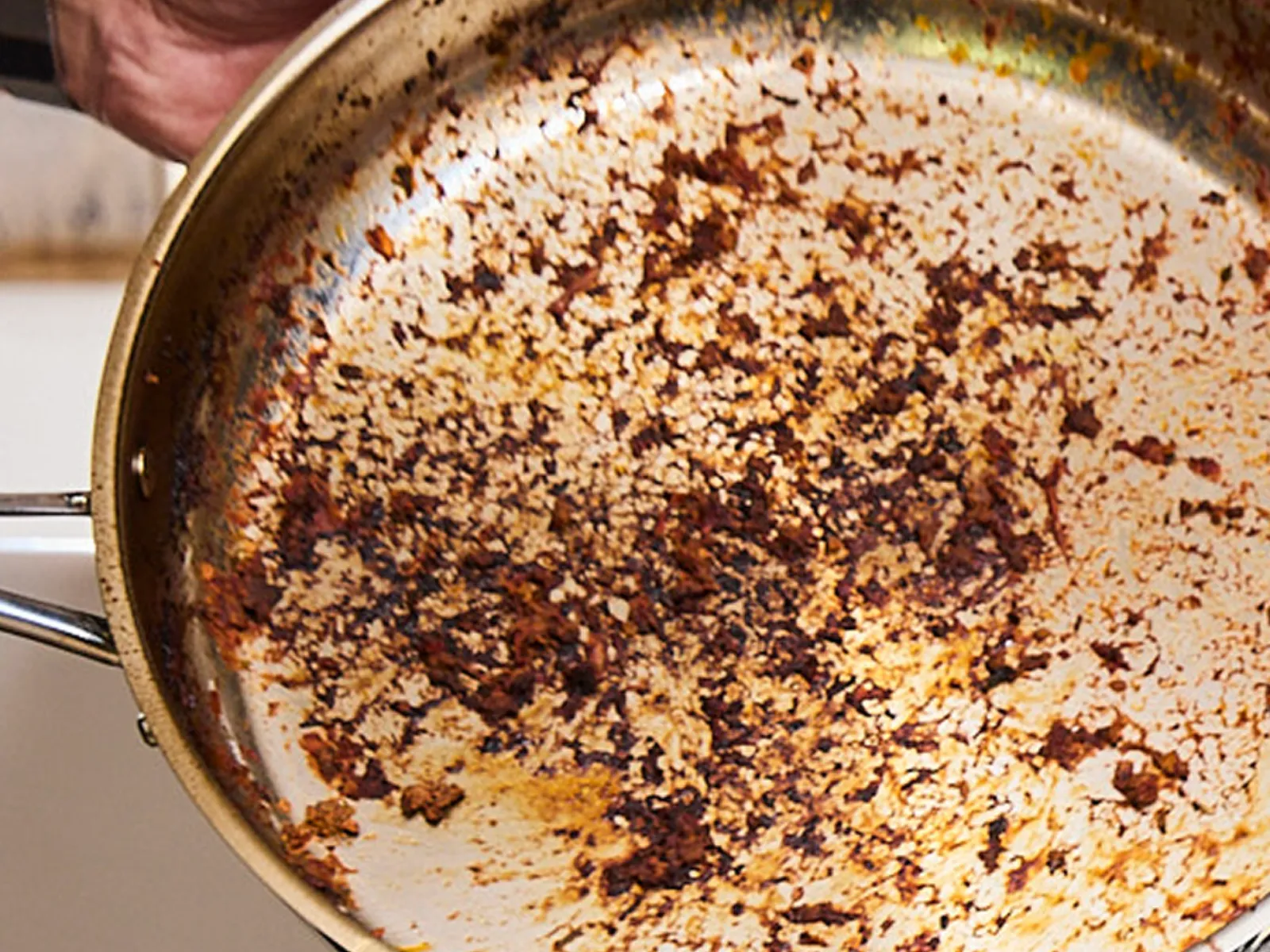 Pan with greasy meat sauce leftover