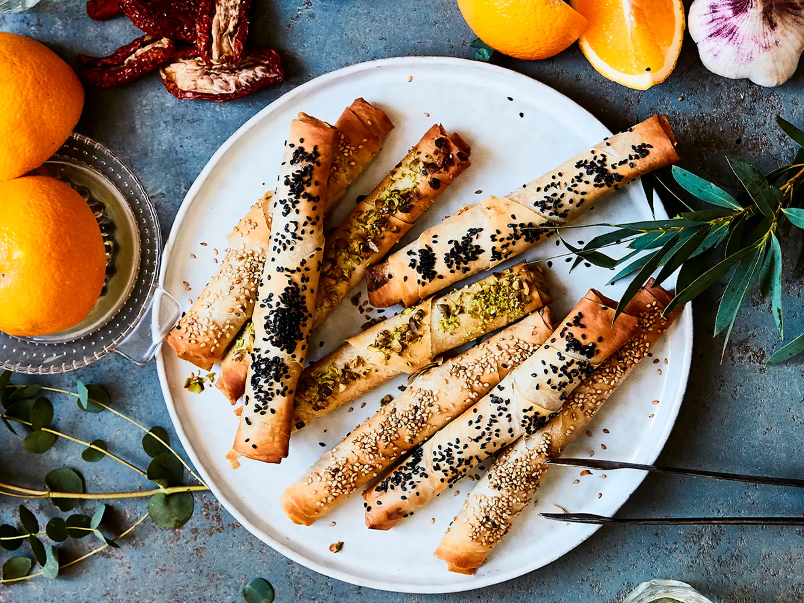 Pastry cigars with orange carrot dip