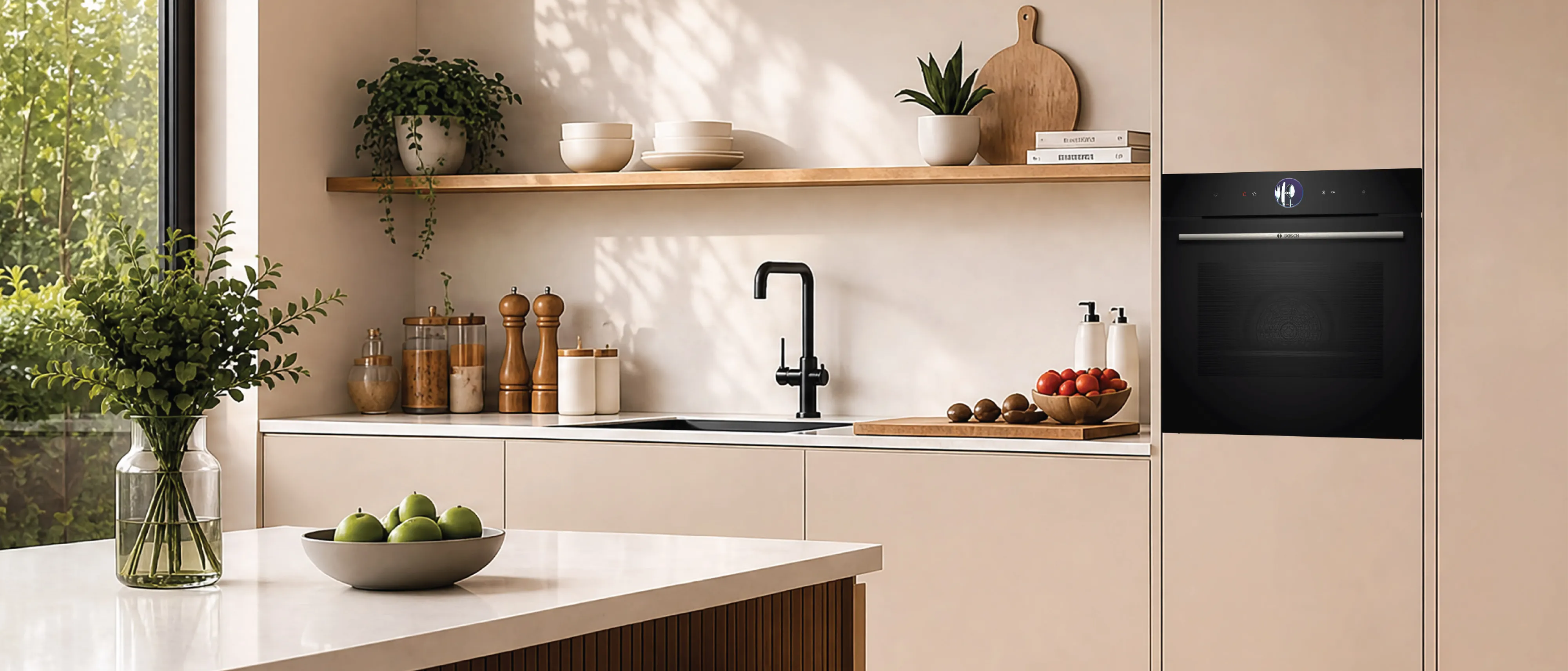 An oven and microwave in a modern living environment.