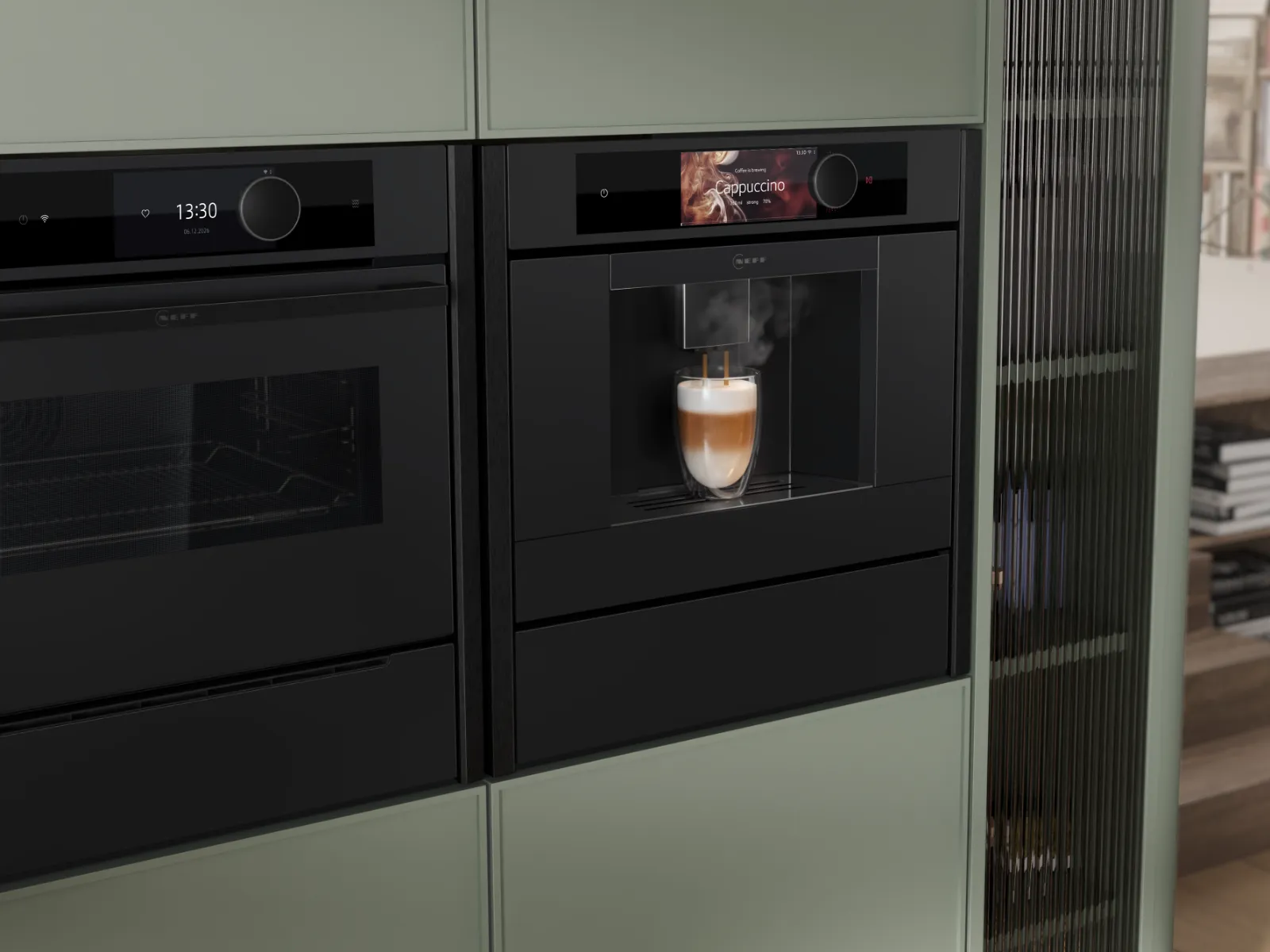 Built-in coffee machine dispensing a steaming cappuccino into a glass cup within a modern kitchen setup.