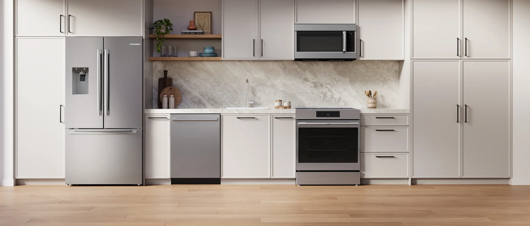 Modern kitchen with stainless steel appliances, white cabinets, marble backsplash, and wooden shelves with decorative items.