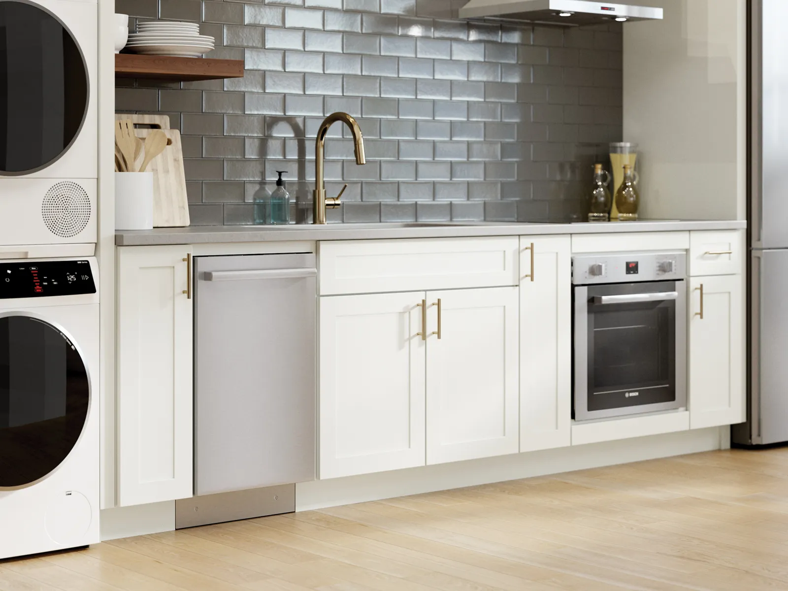 Bosch 18" dishwasher next to Bosch washer and dryer, sink and oven