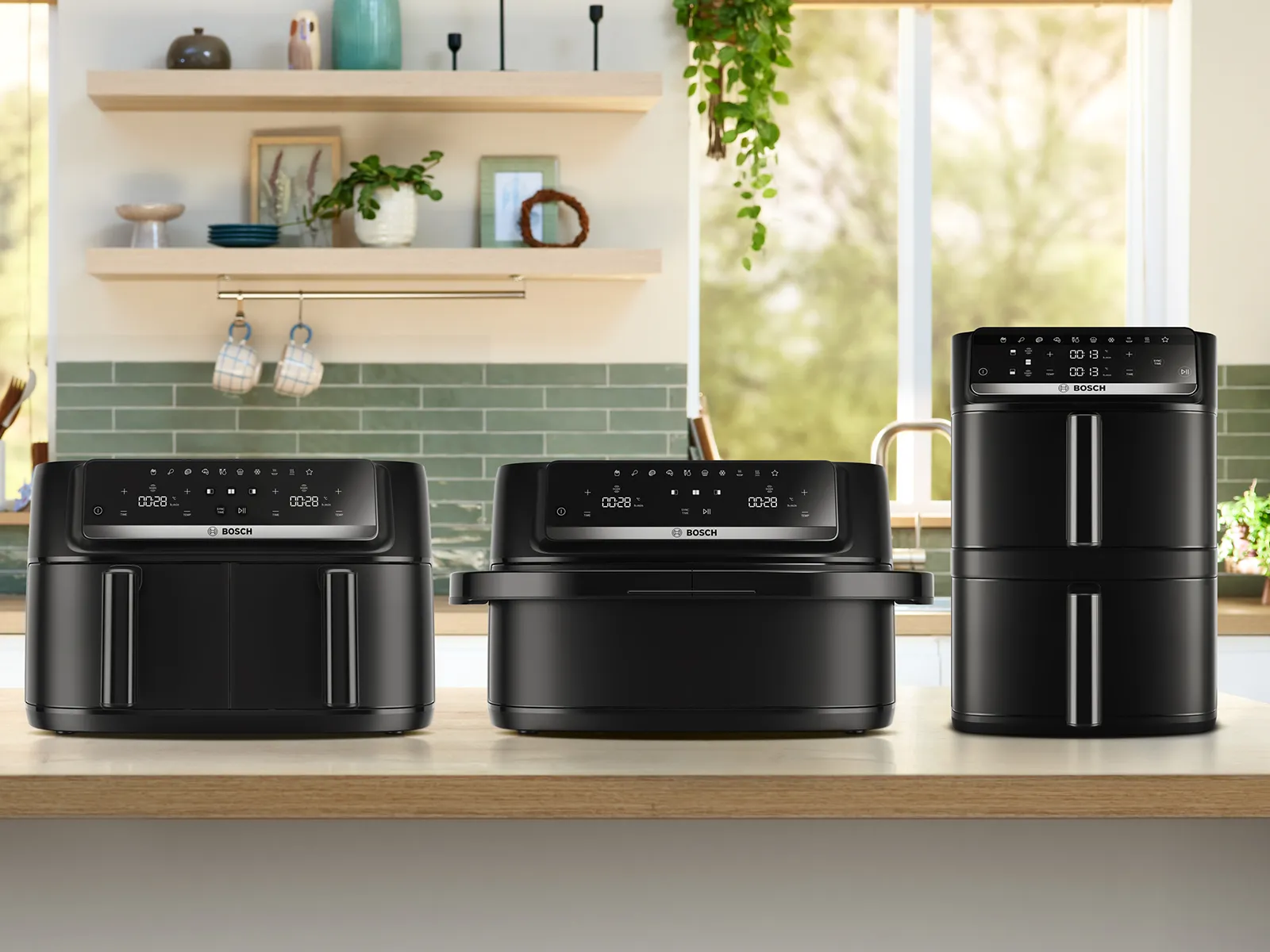 Three Bosch double drawer air fryers on a kitchen counter.