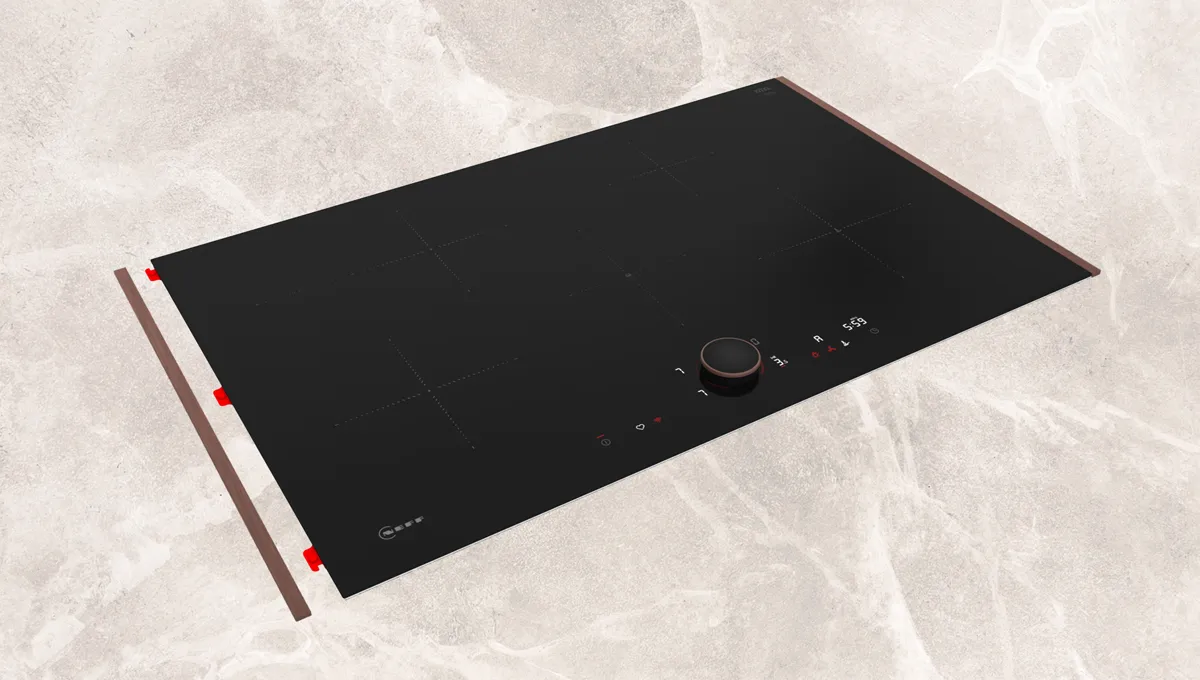 Black glass cooktop with control knobs and red accents.