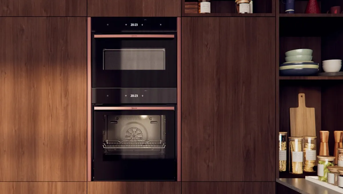 Wooden kitchen cabinets, built-in oven, shelves with kitchenware, minimalist design.
