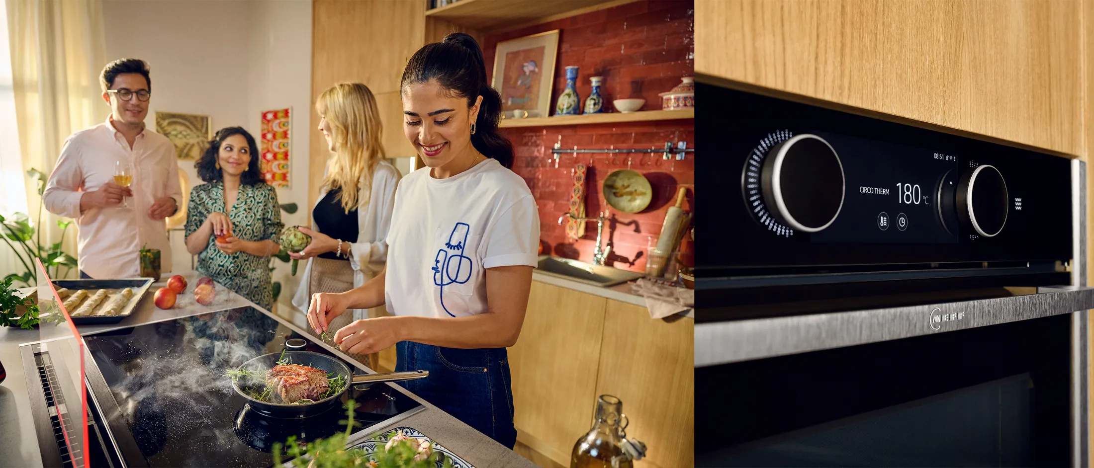 Anahita cooking with friends, close-up of Slide & Hide ® oven with two Twist Pads ®