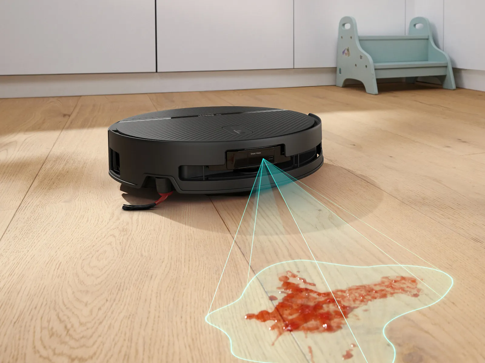 Spotless 2 Advanced targets a fresh red stain on the wooden floor, using its Smart Stain Removal feature for a deep clean.
