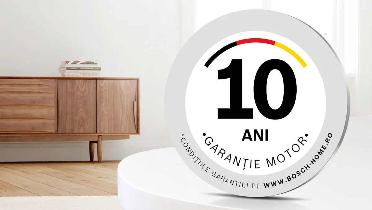 Insignă rotundă cu textul „10 ANI GARANTIE MOTOR” și un arc parțial roșu și galben deasupra cifrei 10