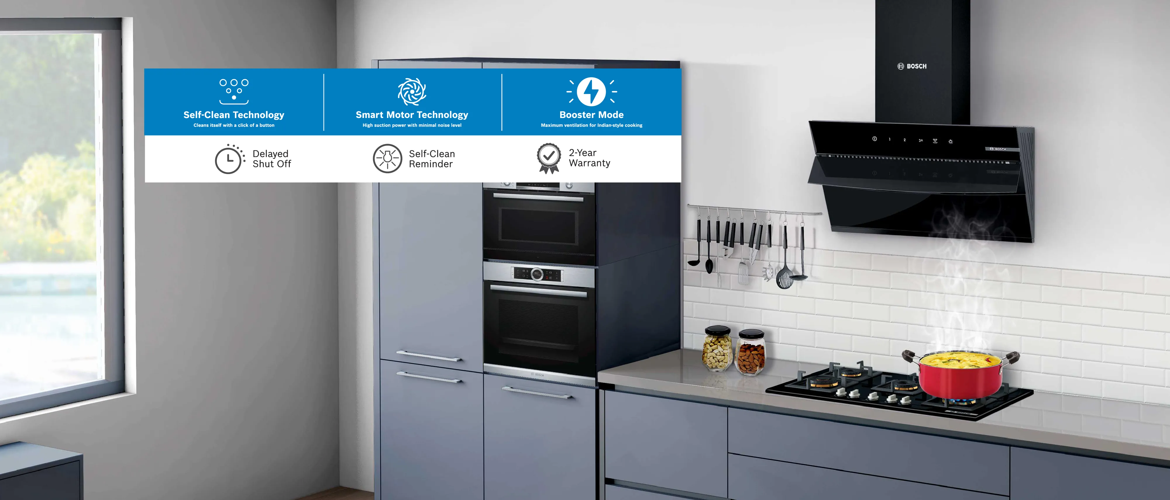 A modern kitchen with a black range hood over a stovetop with a steaming pot, and a graphic highlighting "Self Clean Technology," "Smart Motor Technology," and "Booster Mode" features.