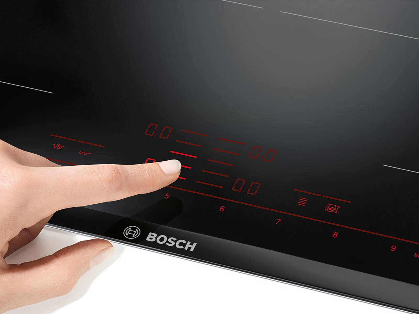 Placa de inducción Bosch con display digital y ajuste manual de la temperatura.