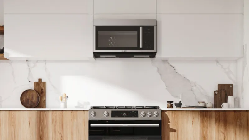 Stainless steel Bosch microwave oven with a sleek design, featuring a black glass door and a digital control panel on the right.