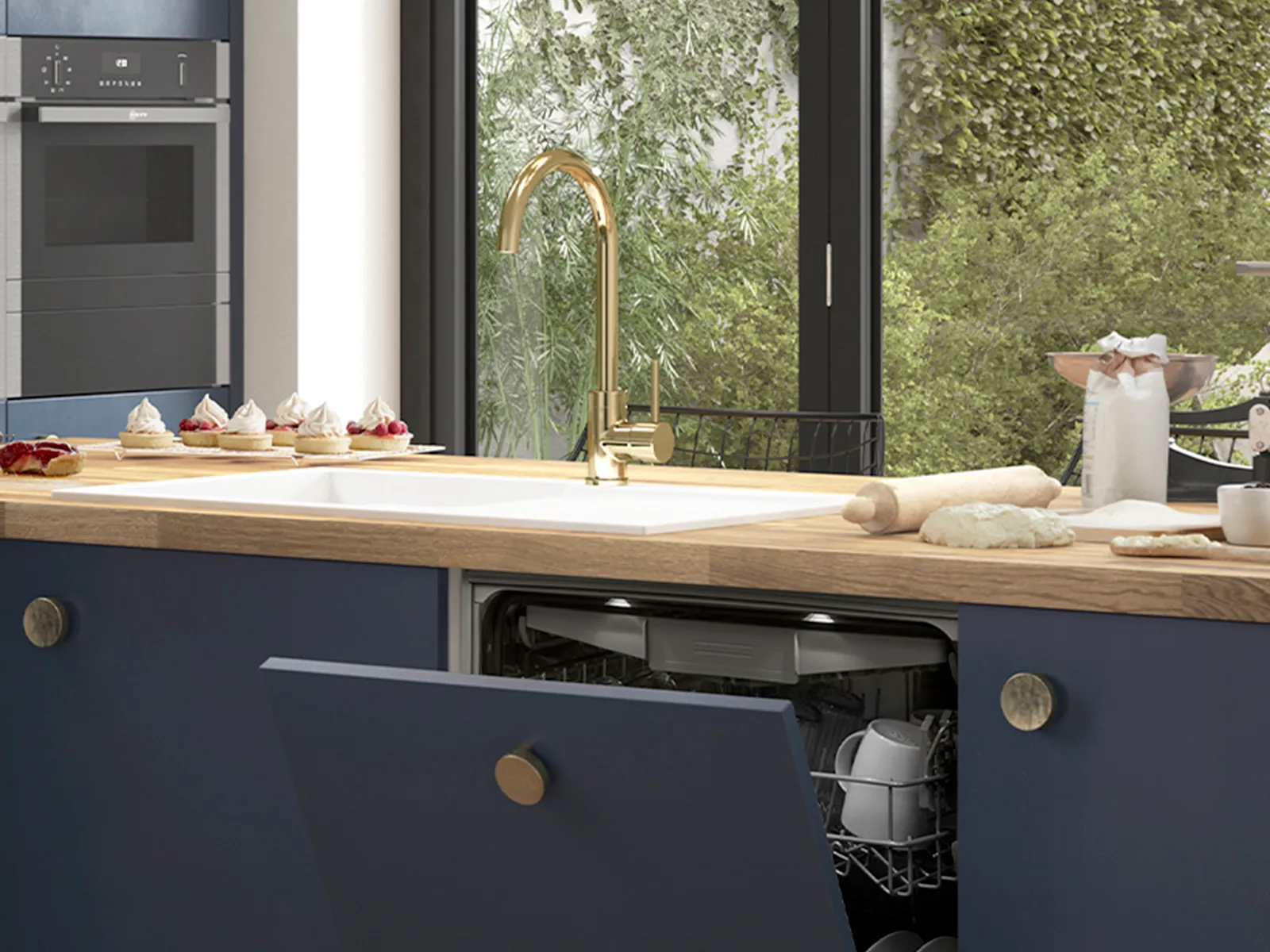A modern kitchen with blue cabinets and a wood countertop, featuring an open, fully integrated NEFF dishwasher below a white sink with a gold faucet.