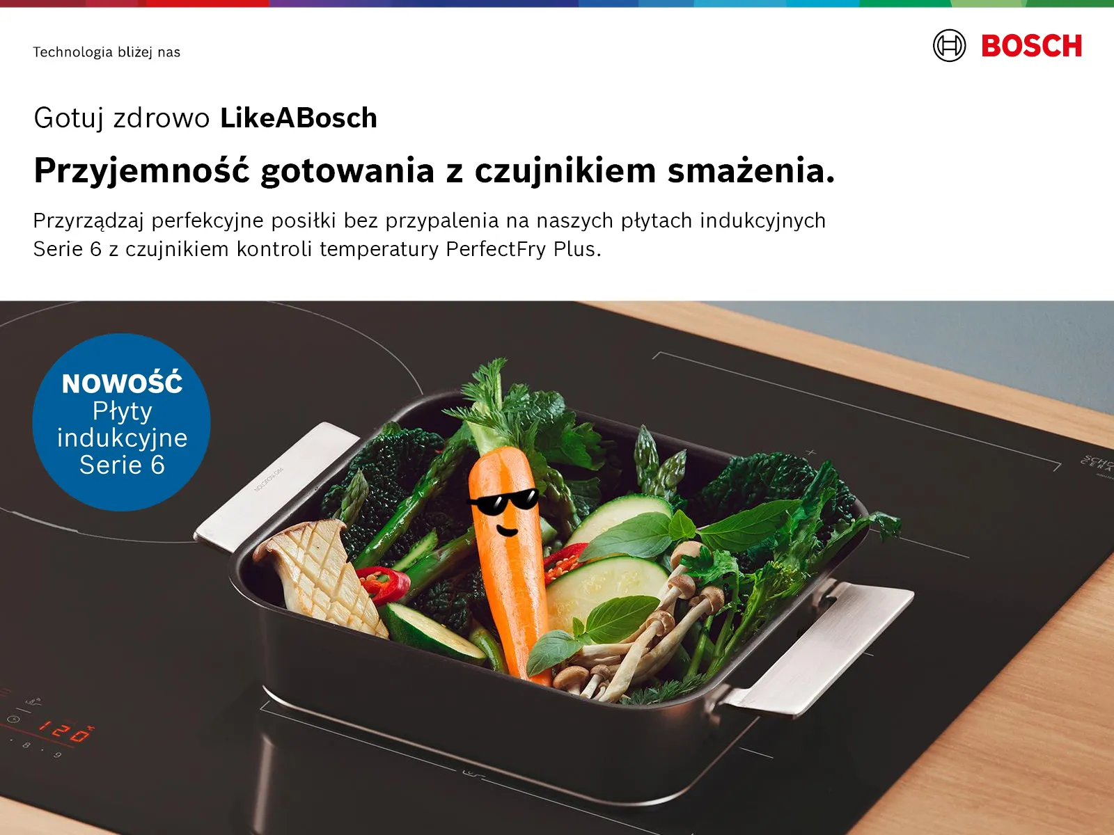 Obraz przedstawia nowoczesne wnętrze kuchni z czarną szklaną kuchenką, półki i oprawione obrazy na ścianach.