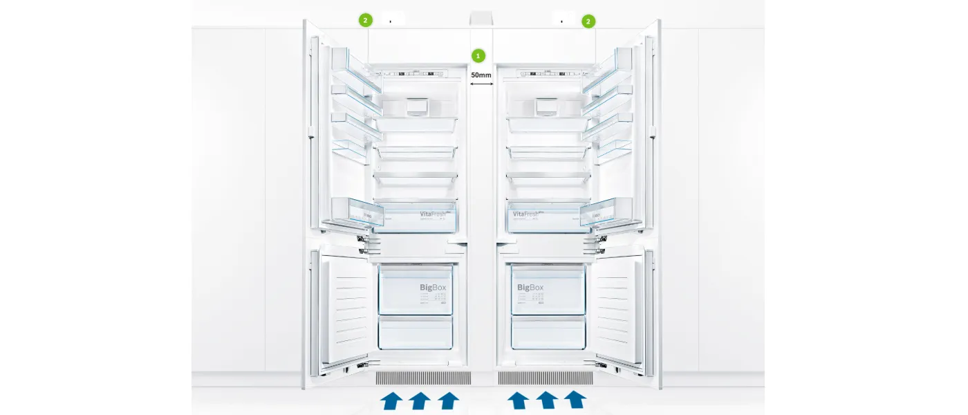 Two identical white refrigerators with shelves, drawers, and Big Box storage compartments.