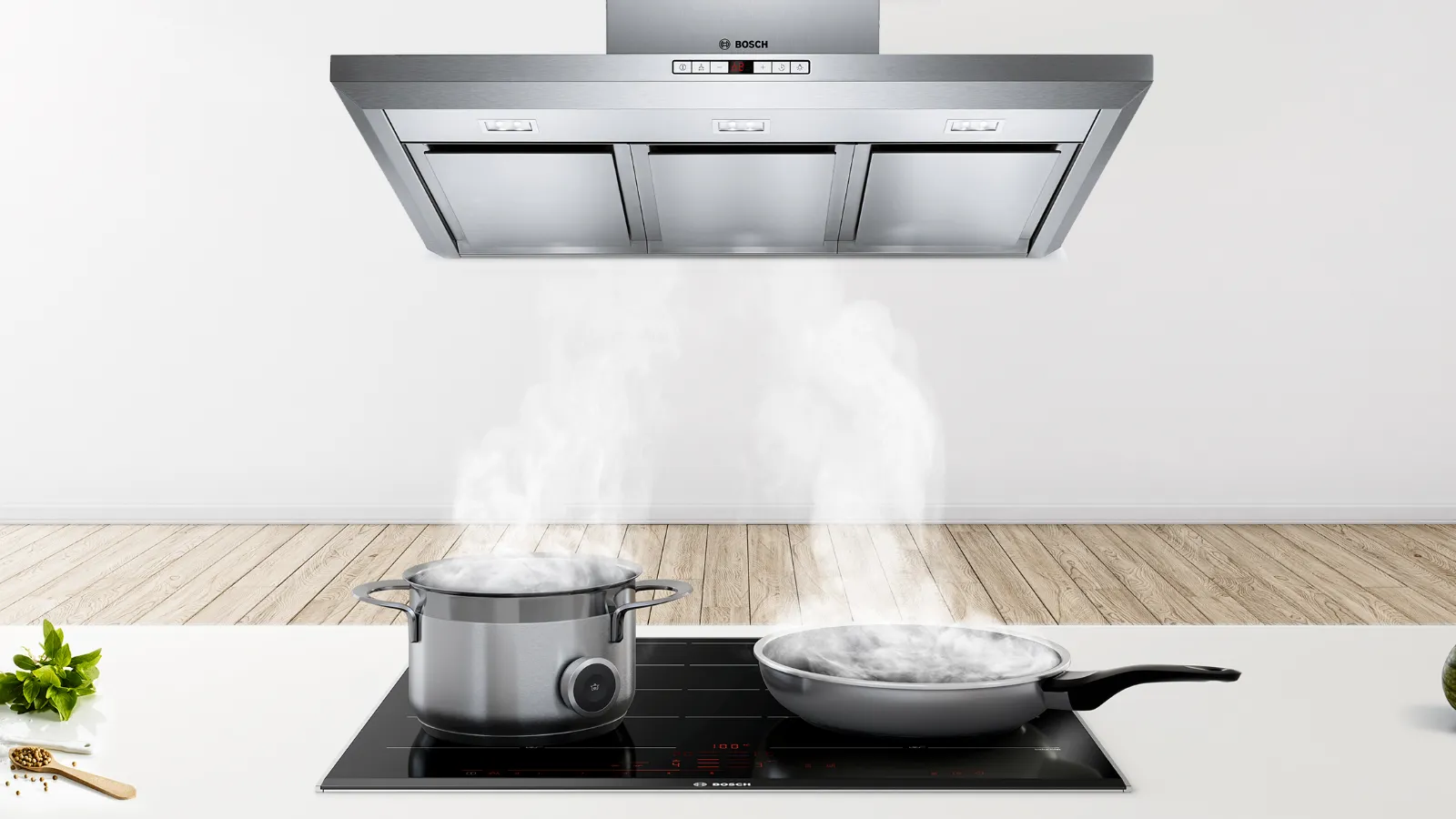 Kitchen appliances, cooking utensils, and fresh produce on a wooden counter with a steam-emitting pot.