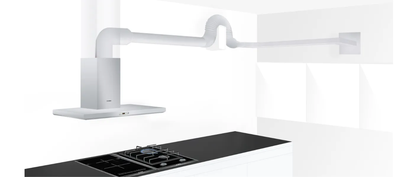 Modern kitchen with gas stove, white extractor fan, and minimalist design.
