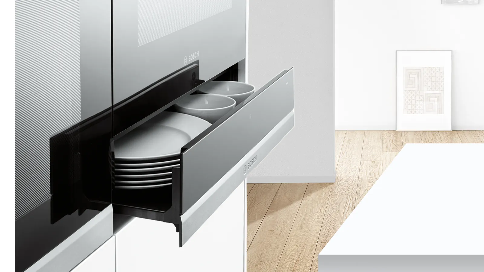 Modern kitchen with sleek black cabinets, wooden floor, and fresh produce on the counter.