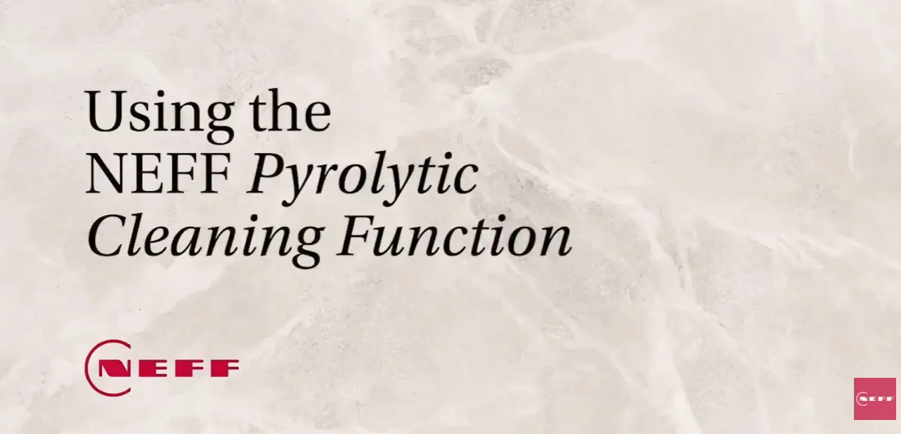 Title slide on a light marble-textured background reading "Using the NEFF Pyrolytic Cleaning Function" in dark serif type; NEFF red logo at the lower left and a small red square with three white dots at the lower right.