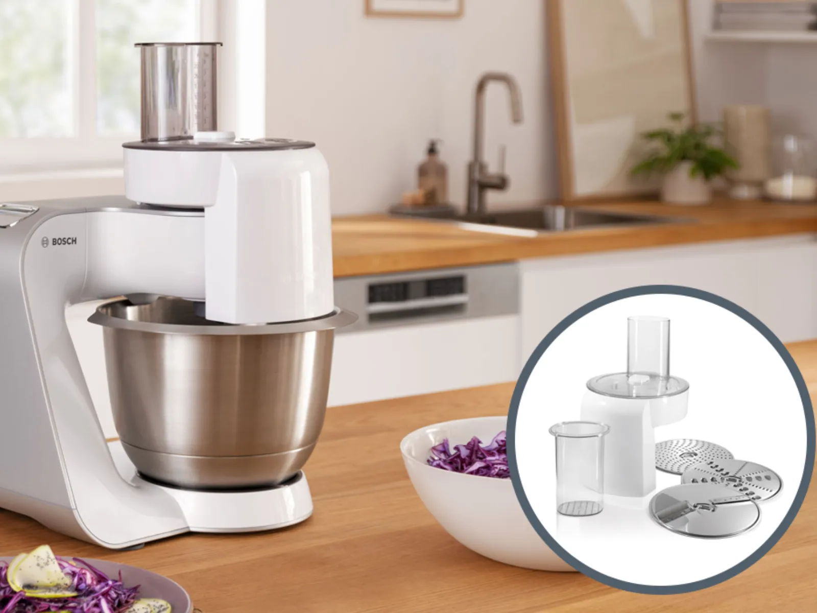 Kitchen appliance, white stand mixer, stainless steel bowl, accessories, wooden countertop, kitchen interior.