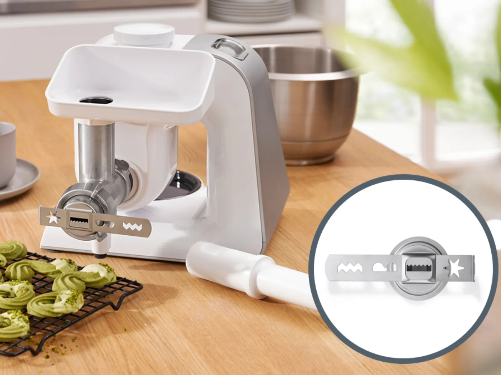 Kitchen appliances, pasta maker, fresh pasta, wooden table, cooking utensils, kitchen counter.