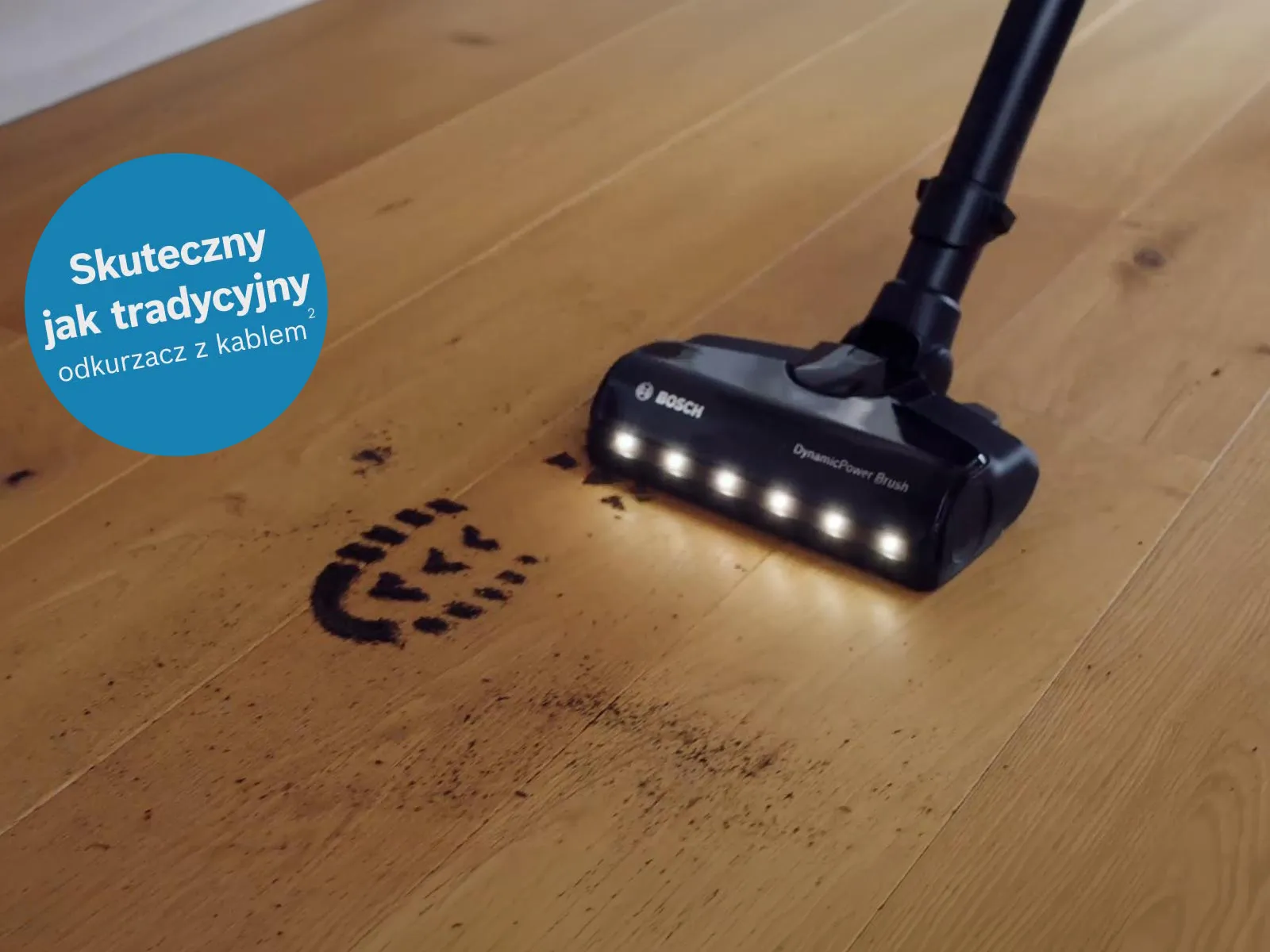 Vacuum cleaner head attached to a cordless stick vacuum. 20230230