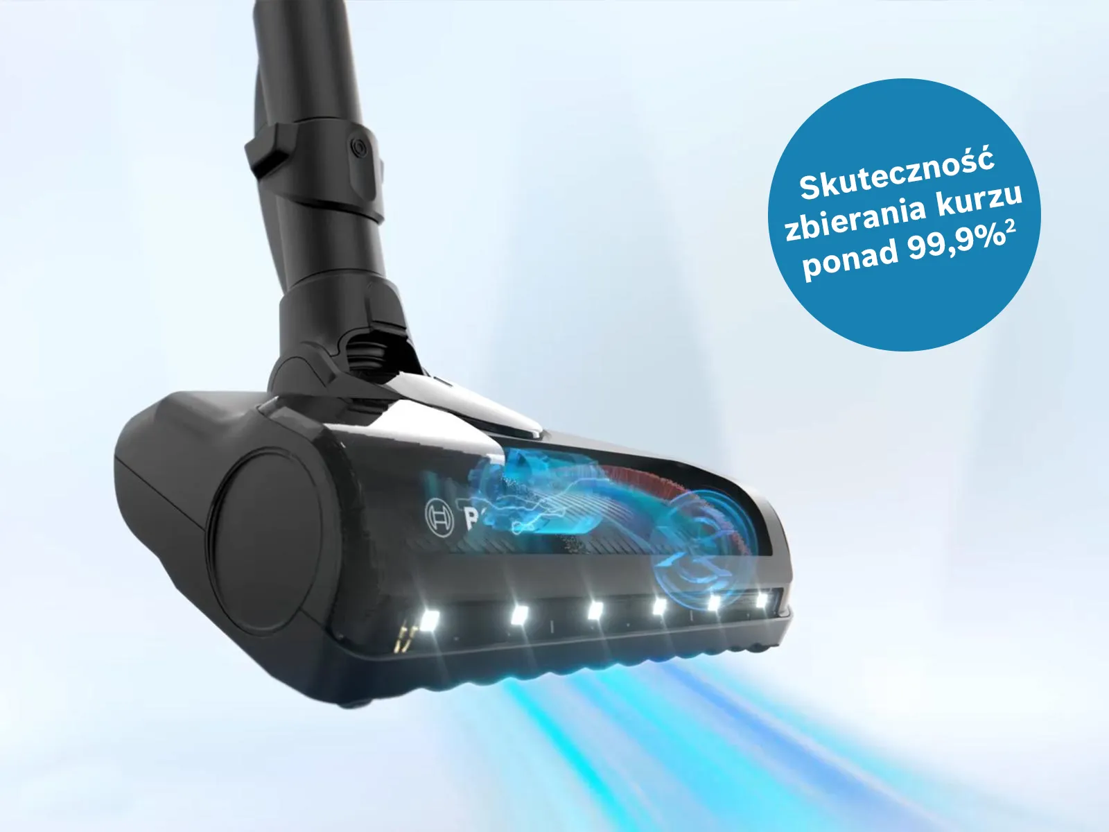 Vacuum cleaner with high cleaning power and over 99.9% dust pickup, against purple background.
