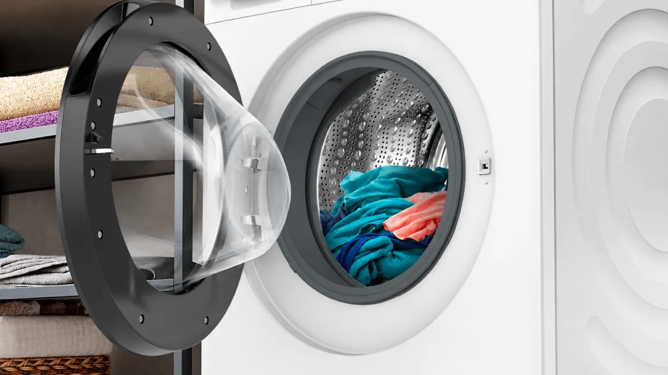 Red sock in White laundry on spin