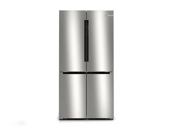 Stainless steel four-door refrigerator with sleek, modern design and digital controls.