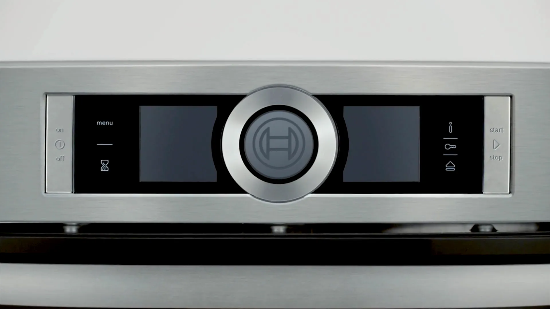 Bedienpanel aus Edelstahl mit digitalem Display und kreisförmigem Bedienknopf.
