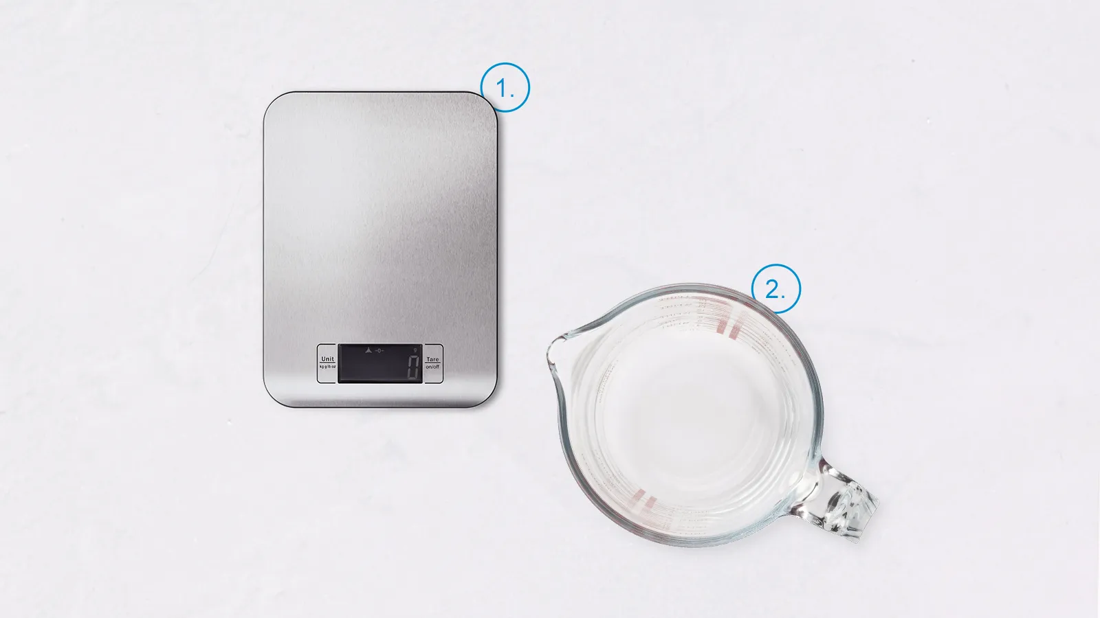 Digital kitchen scale and glass bowl on white background.