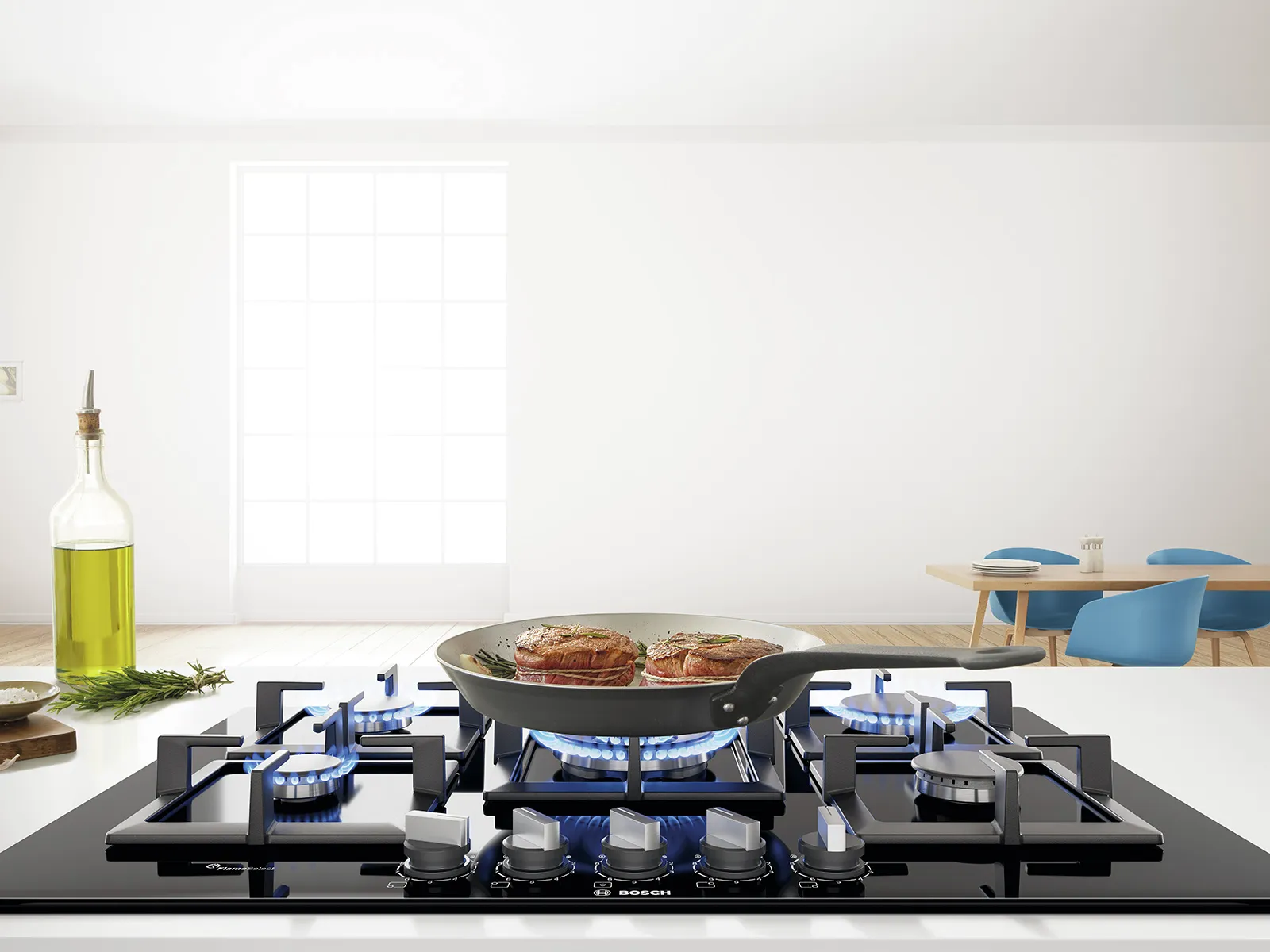 Bosch gas cooktop with a pan of meat cooking, set in a bright kitchen.