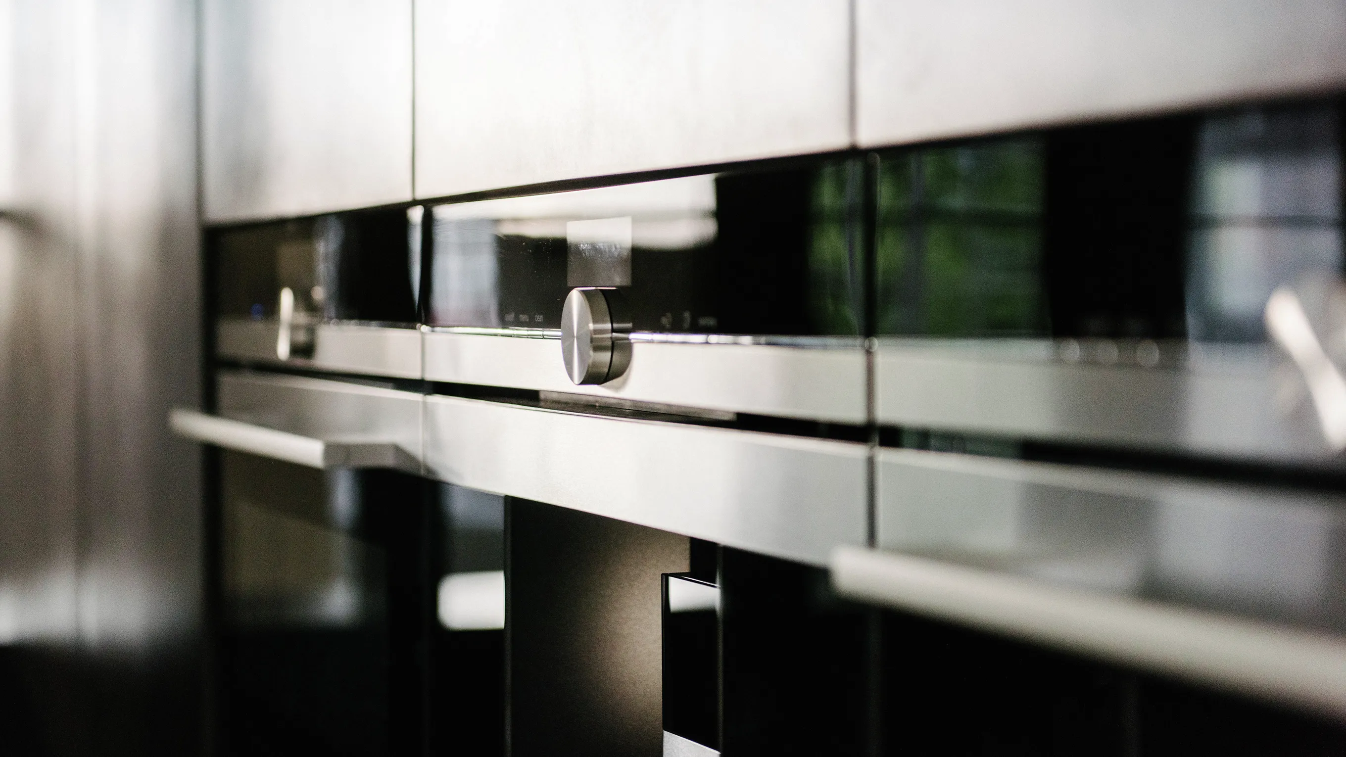 Modern kitchen appliances with sleek, minimalist design.