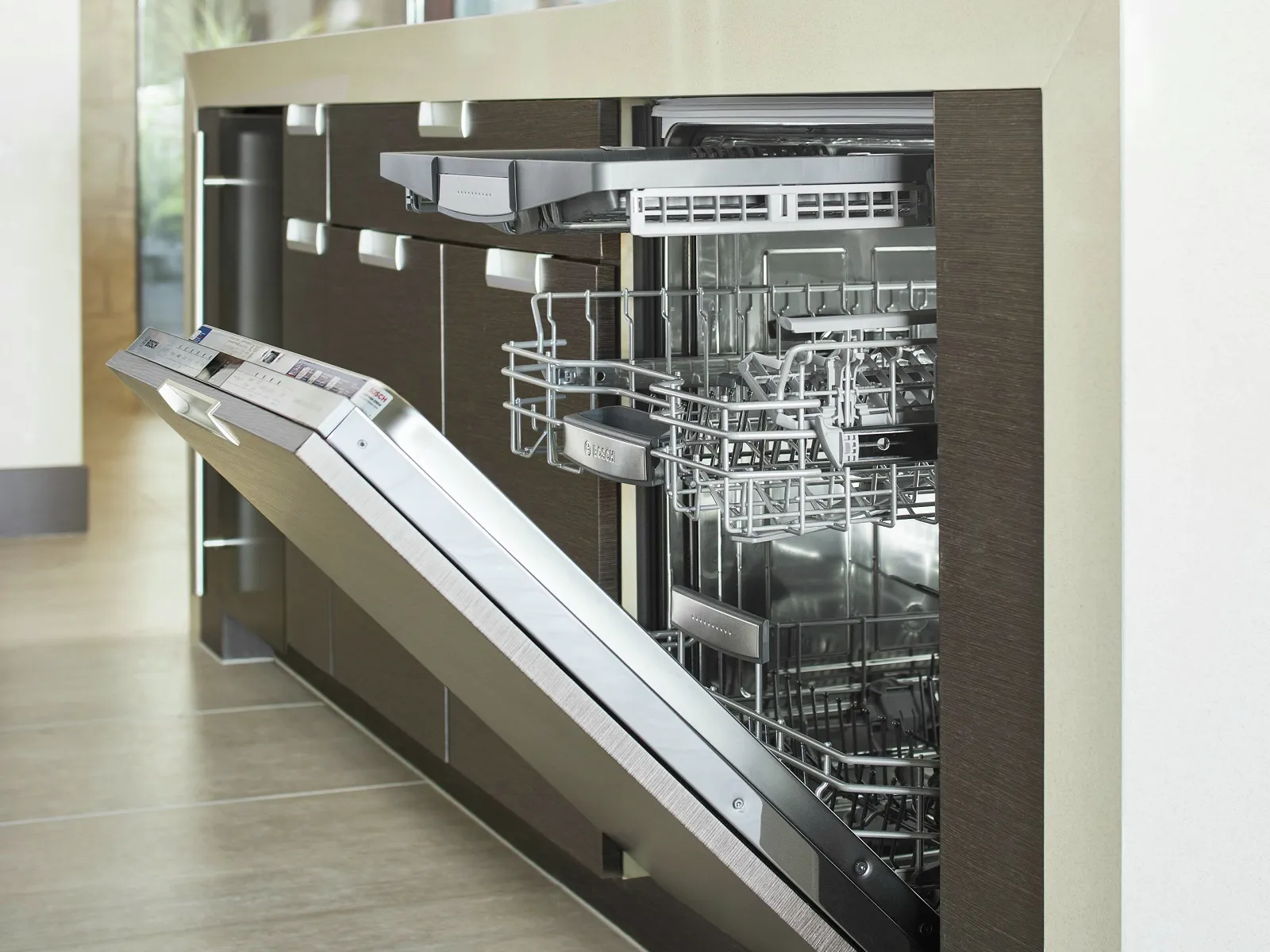 Open dishwasher in the kitchen.