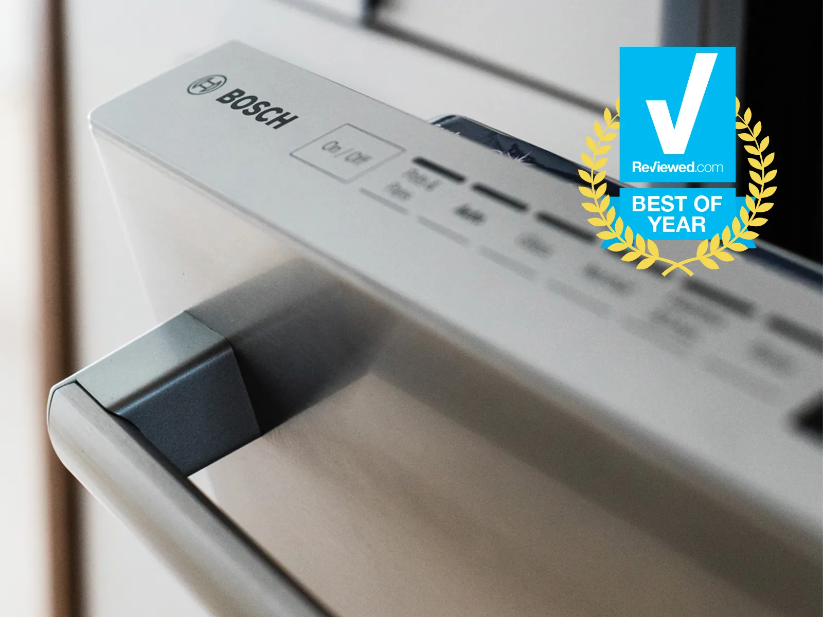 Bosch dishwasher control panel with 'Best of Year' award badge, showcasing design details.