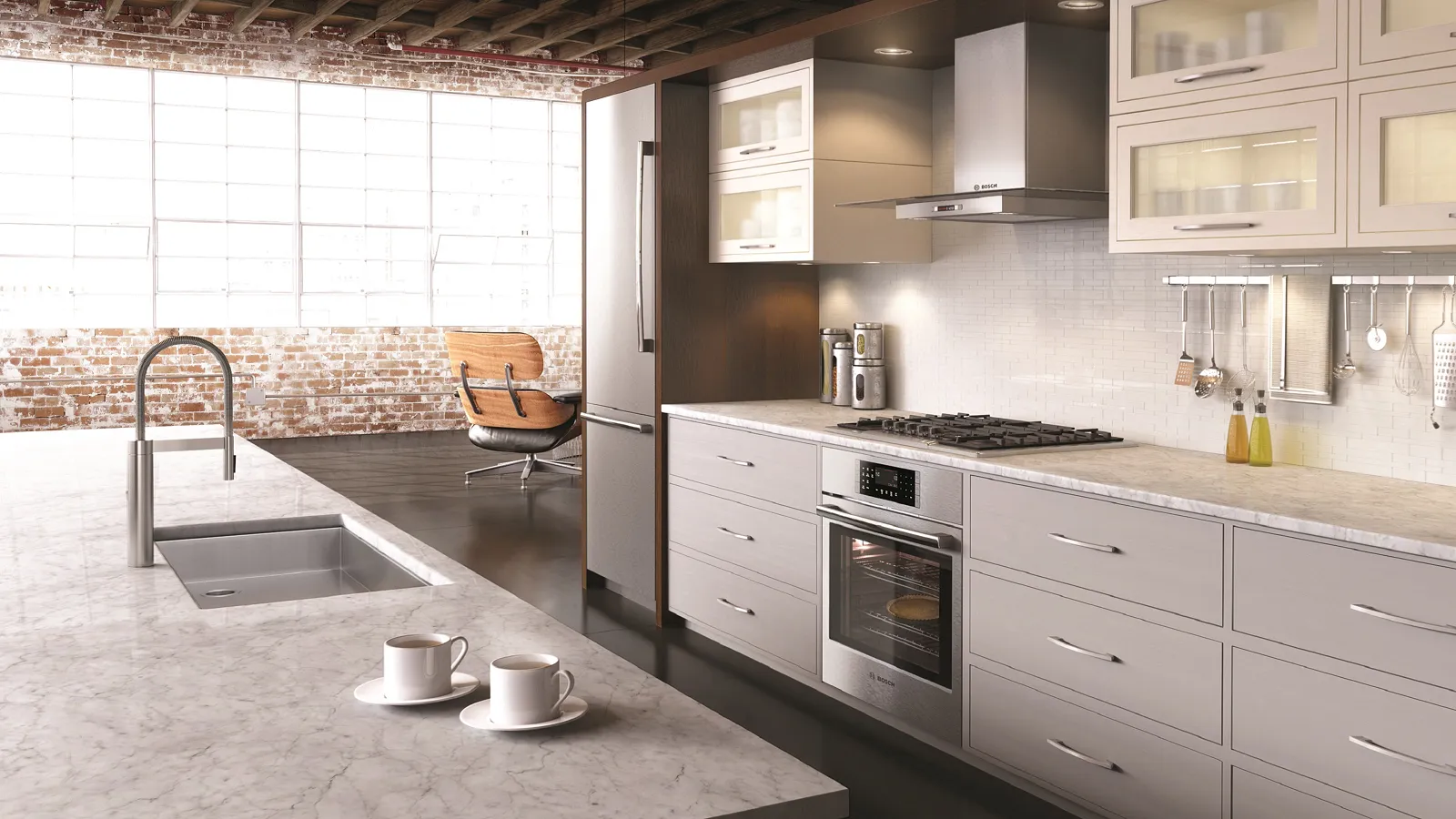 Modern kitchen with marble island, Bosch appliances, and large windows offering natural light.