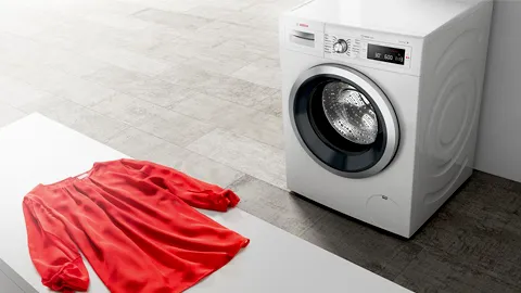 Orange shirt with bosch washing machine