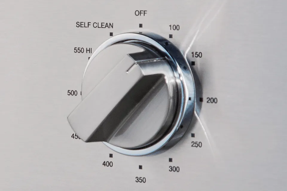 Thermador double oven closeup of knob on self clean mode