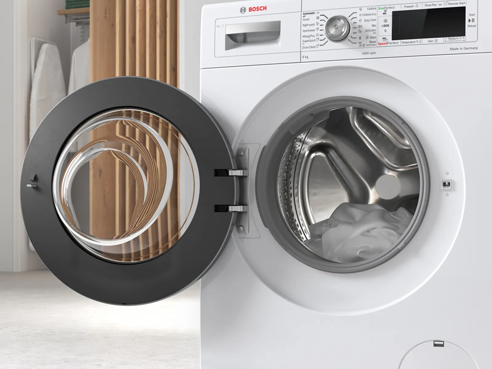 Washing machine with open door, showing interior drum and control panel.
