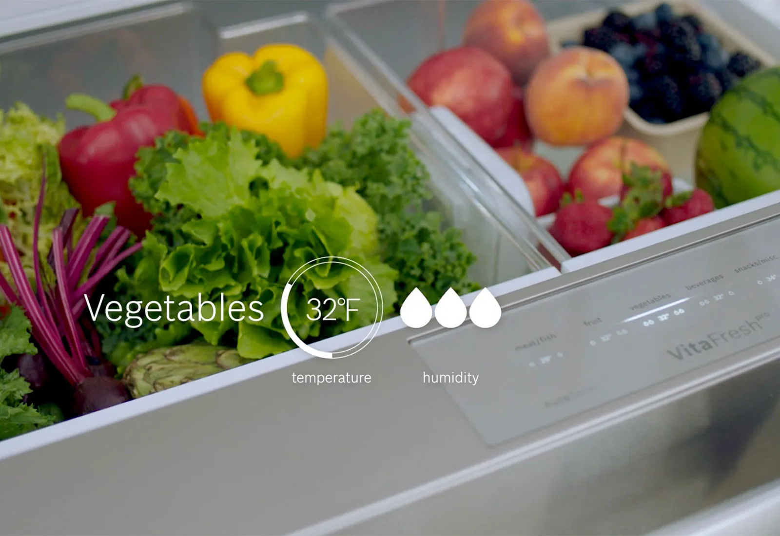 Bosch Refrigerator display showing temperature, humidity, and vegetable storage compartment with various fresh produce using VitaFresh®