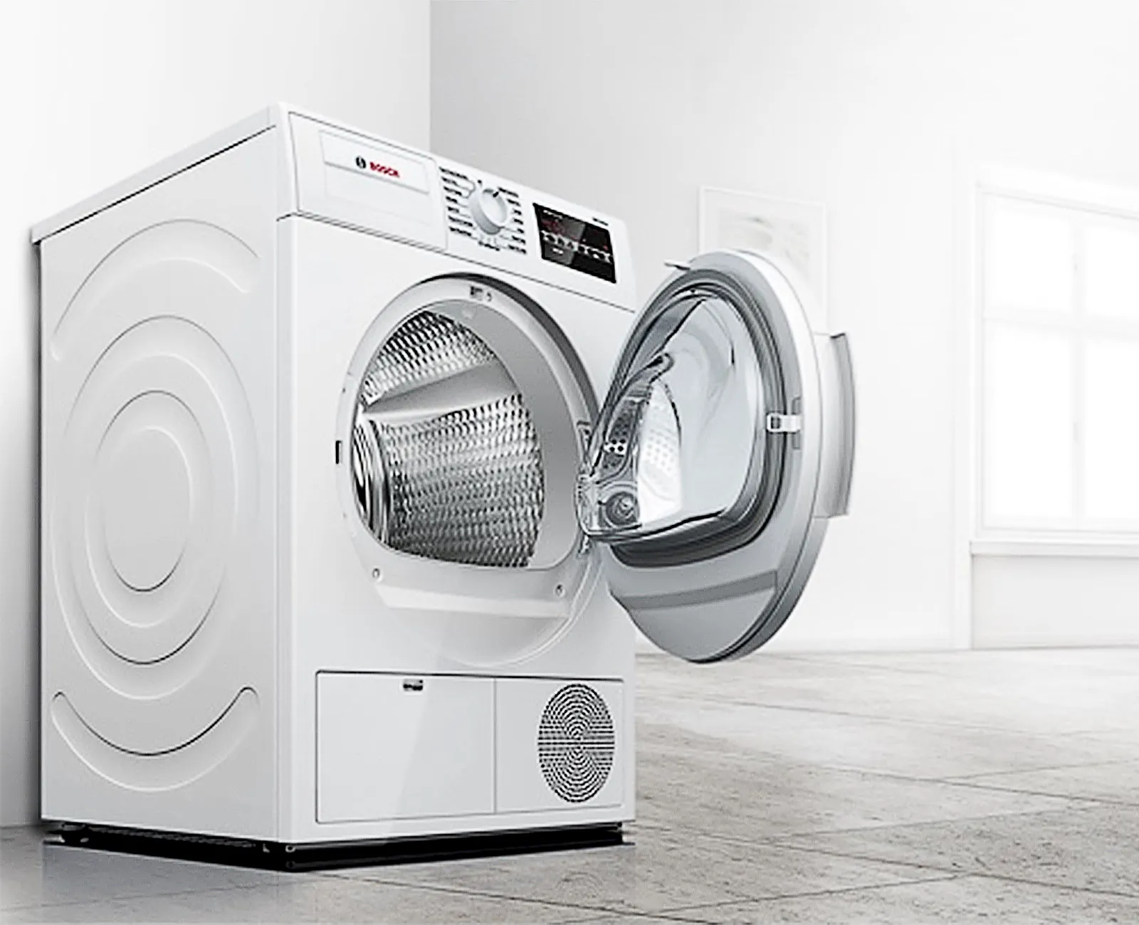 Tumble dryer with the door open