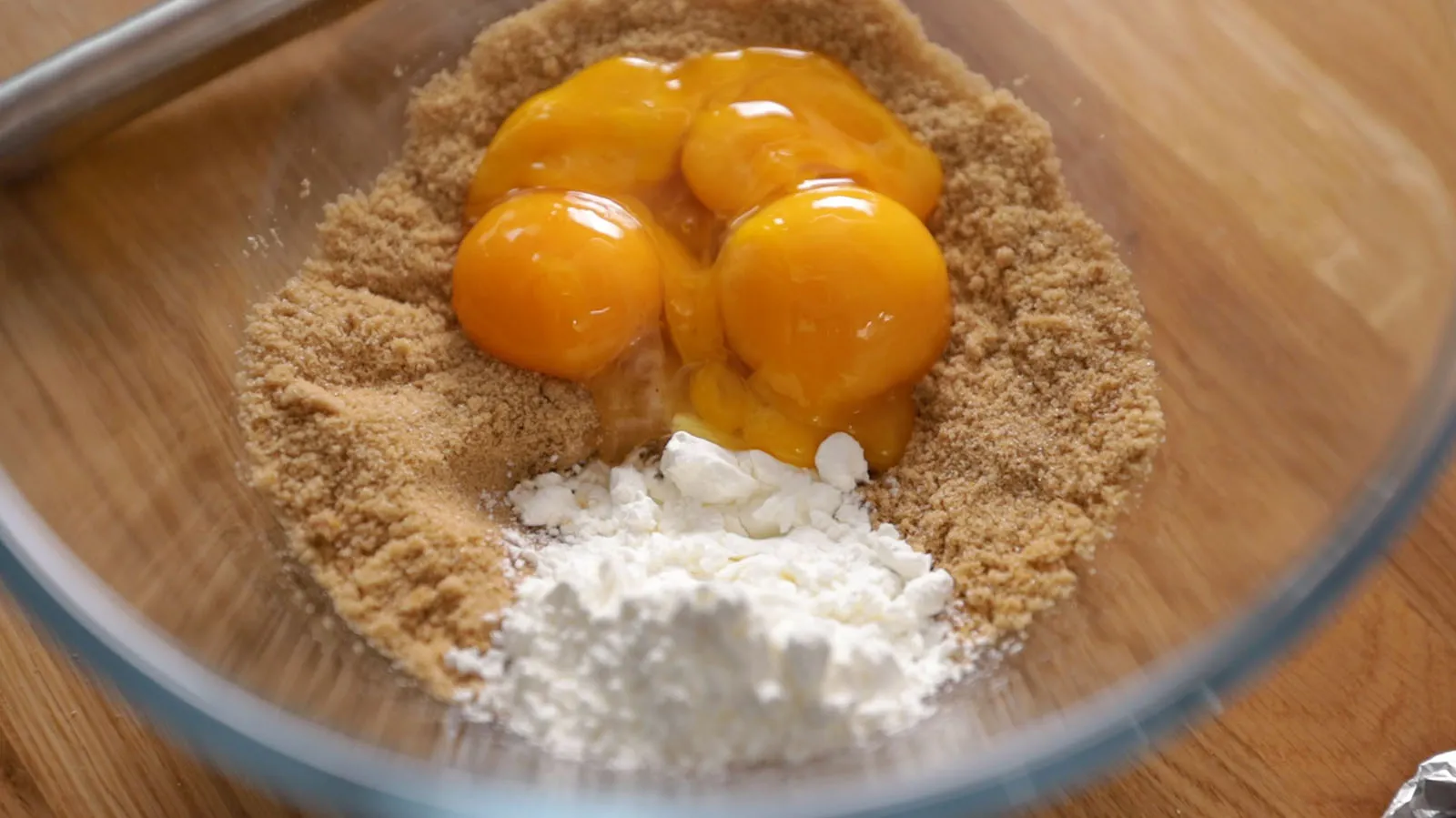 Mixing bowl with eggs and sugar