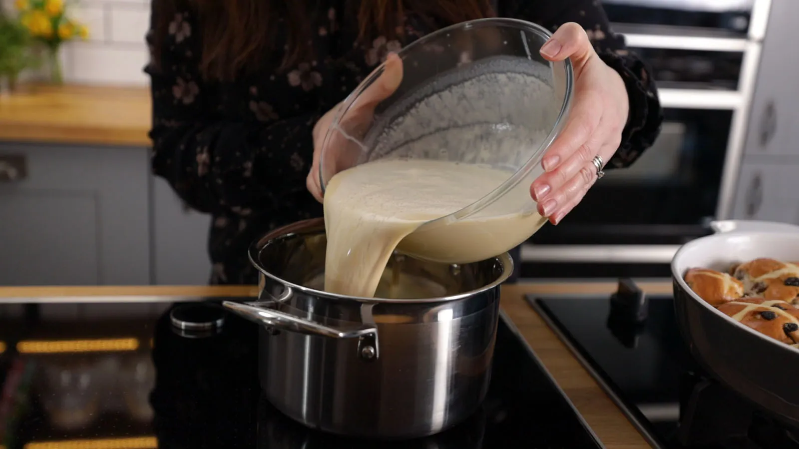 Pouring mixture from bowl to pan