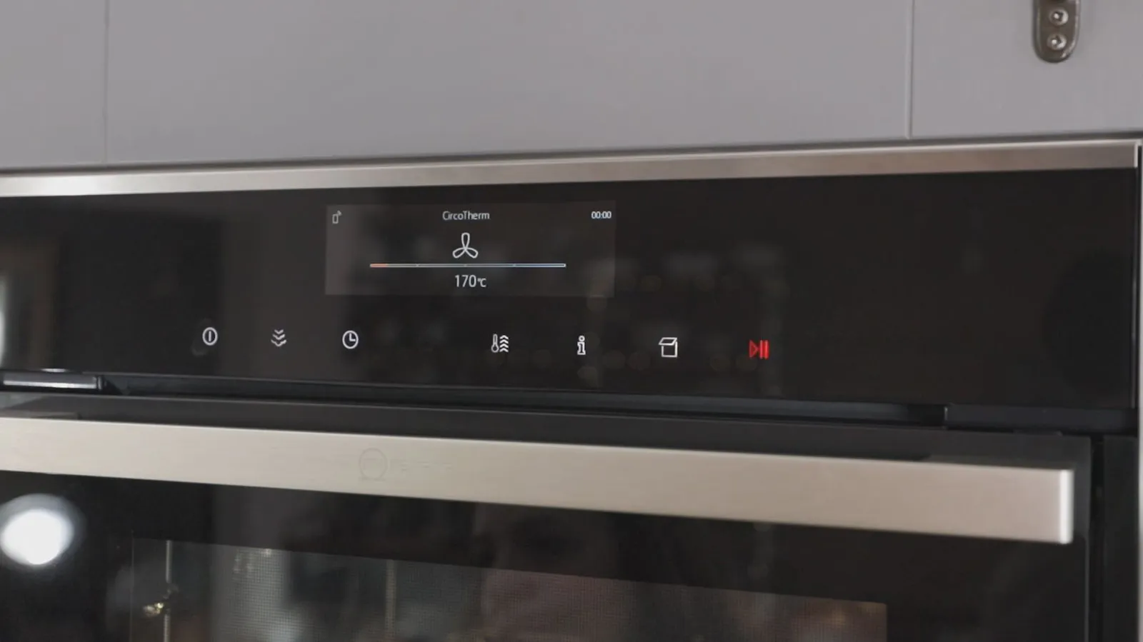 A close-up of a Neff oven's digital display showing "CircoTherm" function with a fan icon and a temperature of 170°C.
