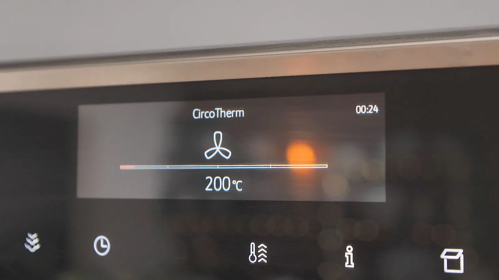 A close-up of a Neff oven's digital display showing "CircoTherm" function with a fan icon and a temperature of 200°C, with a timer set to 00:24.