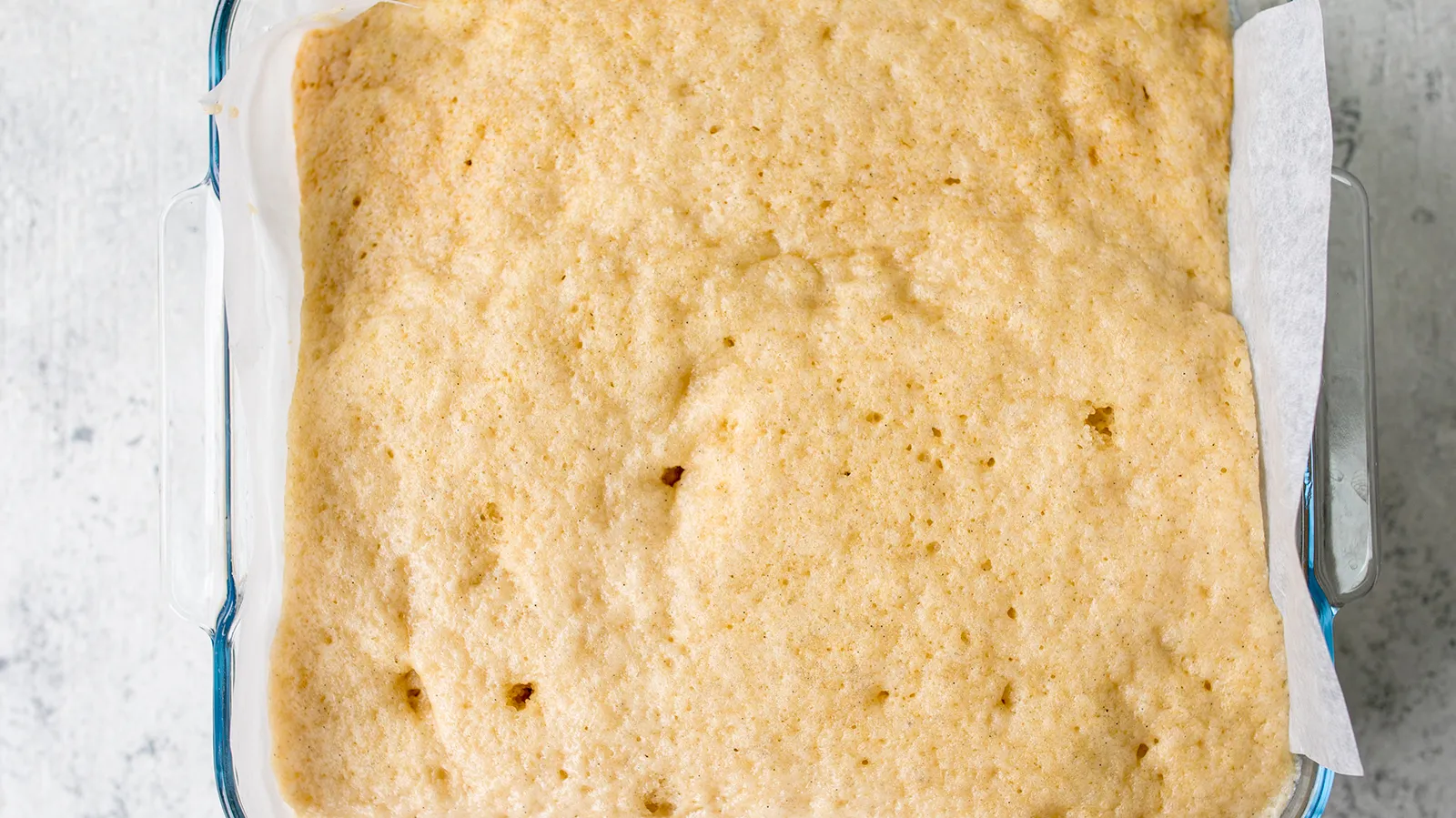 Cooked cake mixture in dish