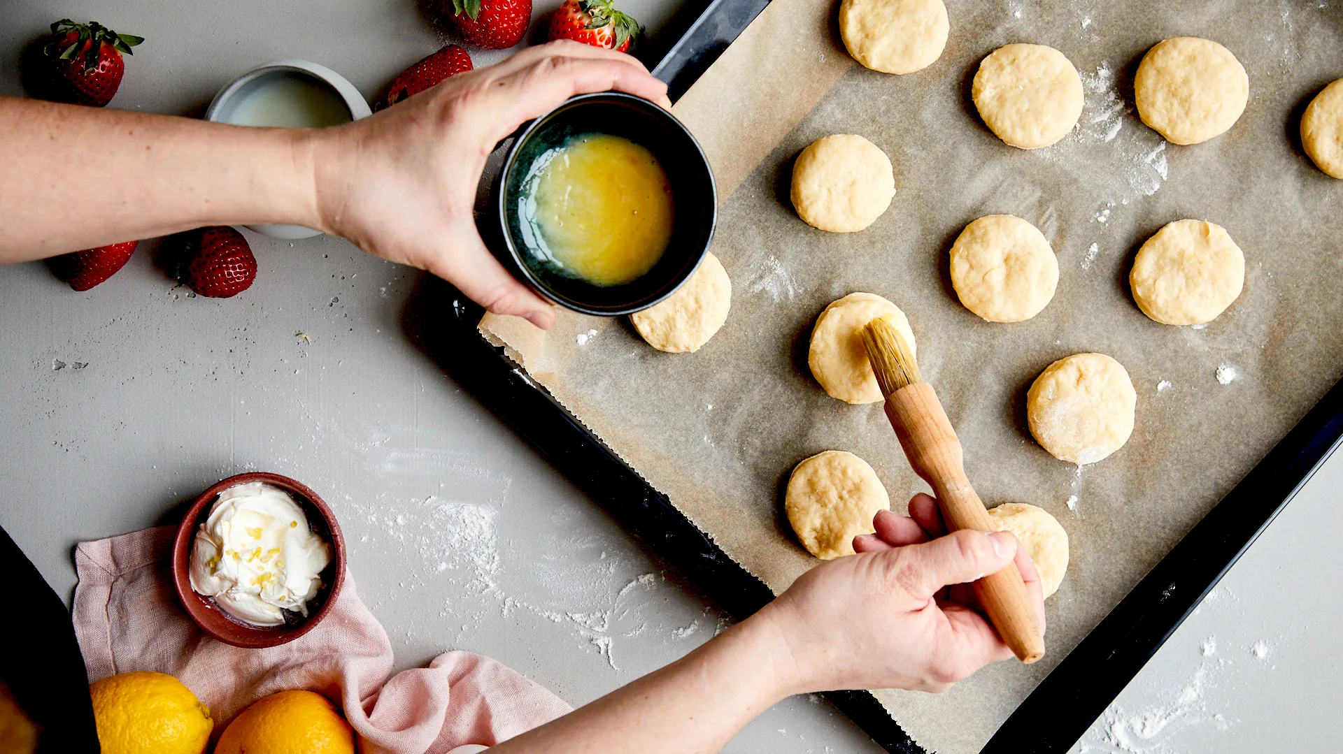 Brushing dough with egg mixture