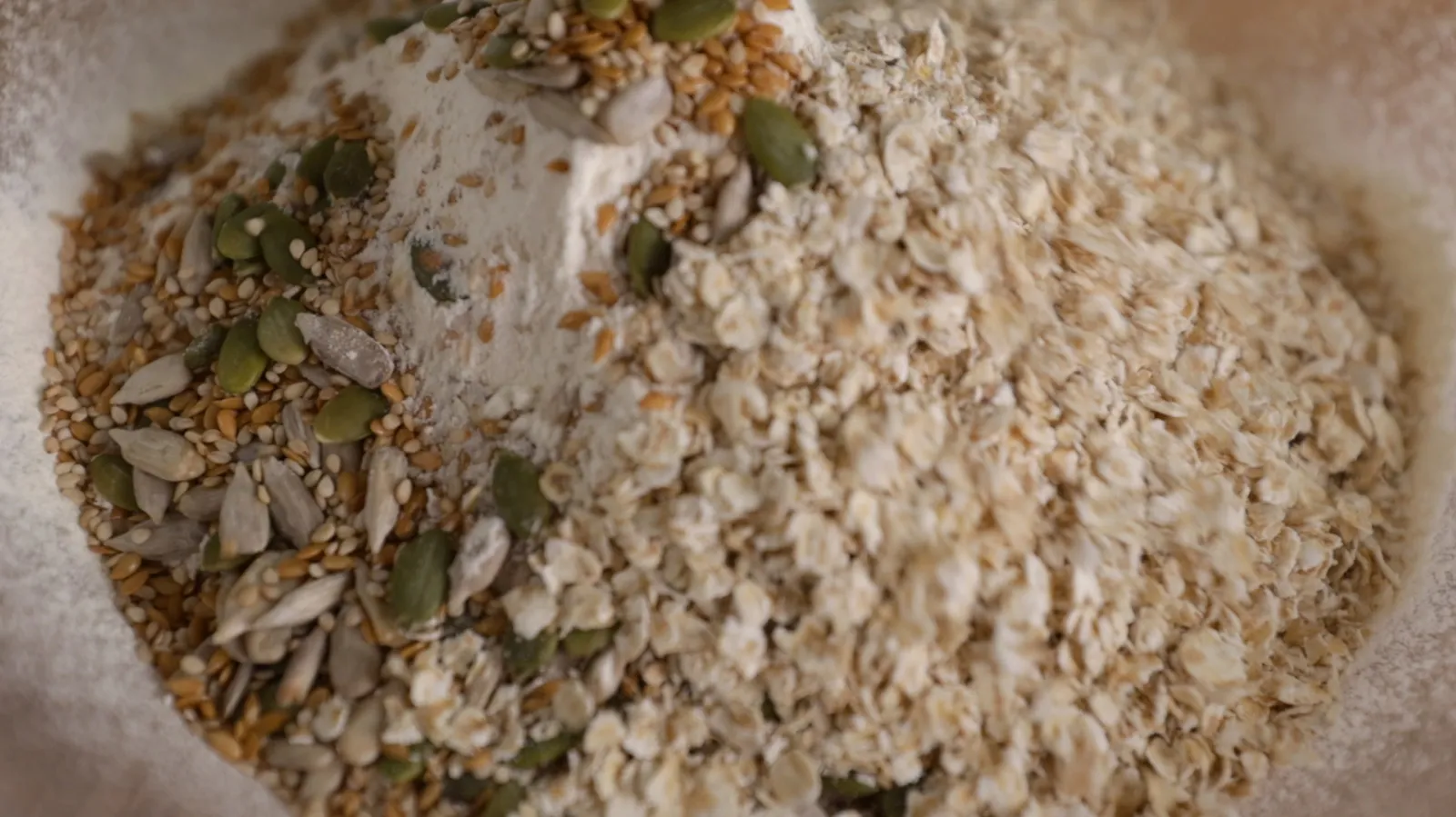 Dry ingredients and seed mix in bowl